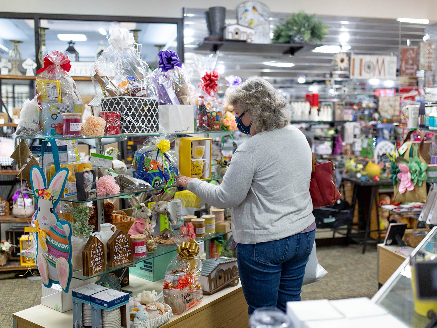 Woman browsing products in the Gift Shop